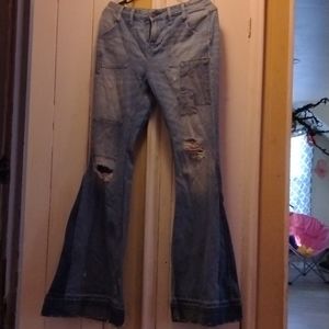 Free people distressed patchwork bell bottom flare